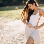 woman-happy-beach_1303-9470